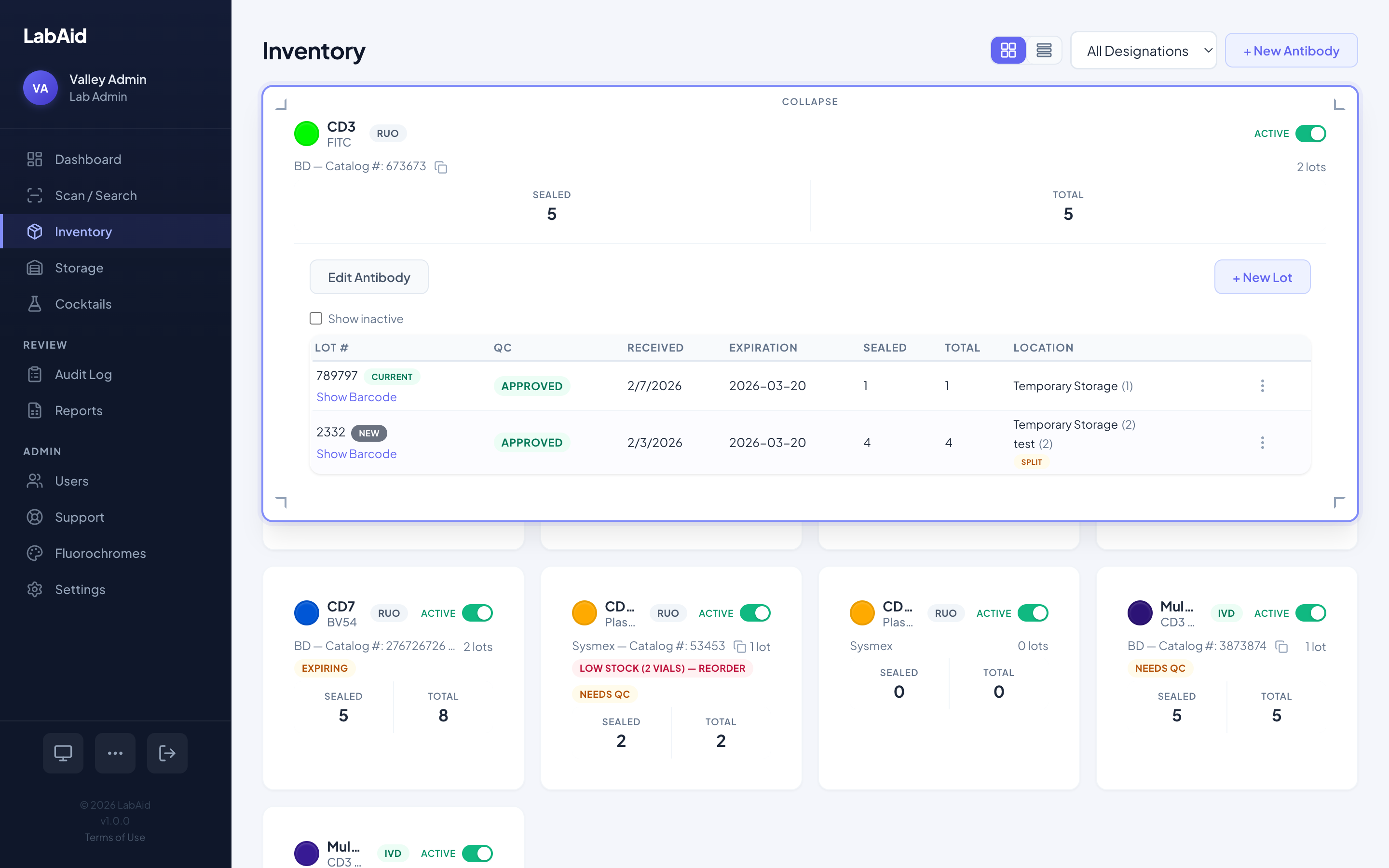 Expanded antibody card showing per-lot tracking with QC status, expiration dates, and storage locations